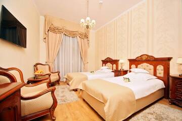 Фото номера Двухместный номер с 2 отдельными кроватями Отель Astoria Grand Hotel г. Орадя 5