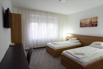 Фото номера Стандартный двухместный номер с 2 отдельными кроватями Отель Carnival City Hotel Oradea г. Орадя 8