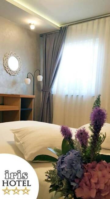 Фото номера Люкс (для 4 взрослых) Отель Iris Hotel г. Орадя 7