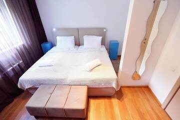 Фото номера Стандартные апартаменты (для 3 взрослых) Апарт-отели Living In Aparthotel г. Орадя 4