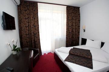 Фото номера Двухместный номер &quot;Комфорт&quot; с 1 кроватью и балконом Отель Hotel Terra г. Орадя 3